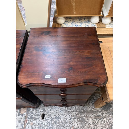 70 - A pair of pine bedside chests of drawers - approx. 67cm high x 46cm wide x 42cm deep