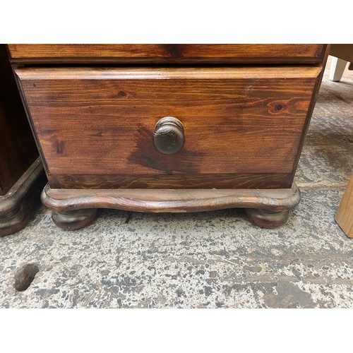 70 - A pair of pine bedside chests of drawers - approx. 67cm high x 46cm wide x 42cm deep