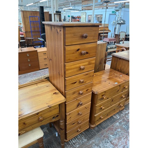 92 - A pine chest of drawers - approx. 141cm high x 43cm wide x 39cm deep