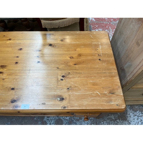 97 - A pine rectangular four drawer coffee table - approx. 53cm high x 58cm wide x 110cm long