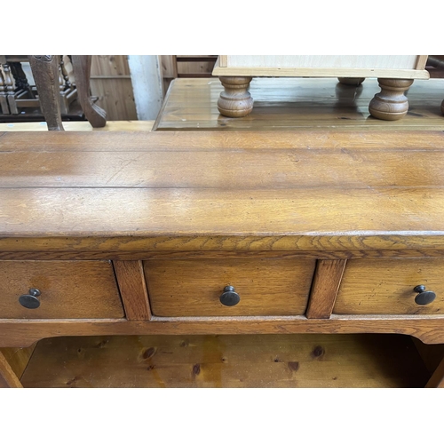 106 - A French Exigence oak two tier bookcase with three drawers - approx. 92cm high x 99cm wide x 31cm de... 