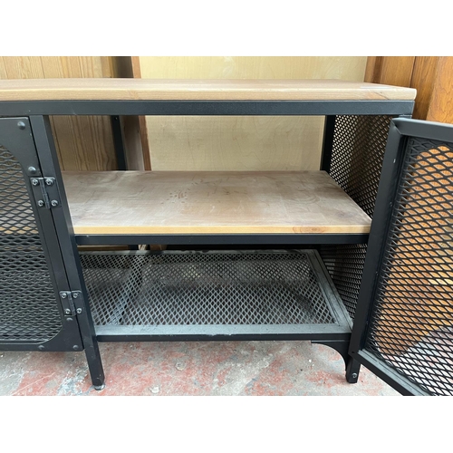 108 - An IKEA FJÄLLBO pine and black metal TV bench - approx. 55cm high x 149cm wide x 36cm deep