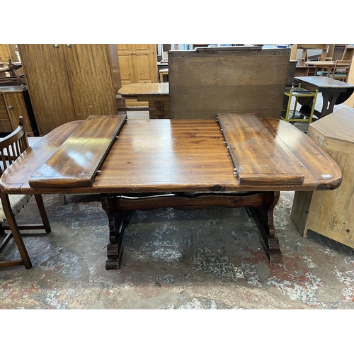 11 - A pine twin pedestal extending dining table - approx. 73cm high x 106cm wide x 191cm long not extend... 