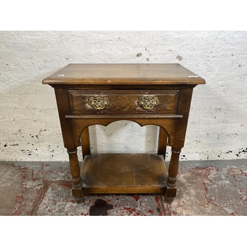 110 - A Georgian style oak two tier side table with single drawer - approx. 75cm high x 65cm wide x 38cm d... 