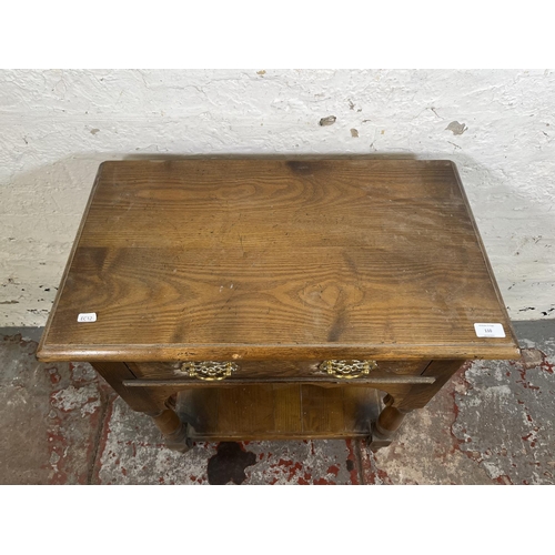 110 - A Georgian style oak two tier side table with single drawer - approx. 75cm high x 65cm wide x 38cm d... 