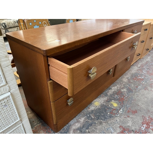 121 - A Stag teak chest of drawers - approx. 64cm high x 148cm wide x 43cm deep