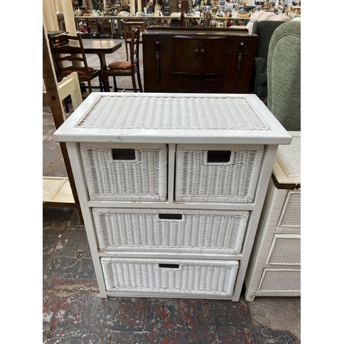 122 - Two white painted wicker chests of drawers - largest approx. 91cm high x 73cm wide x 45cm deep