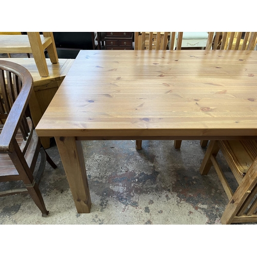 15 - A pine rectangular dining table and four chairs - approx. 75cm high x 100cm wide x 180cm long