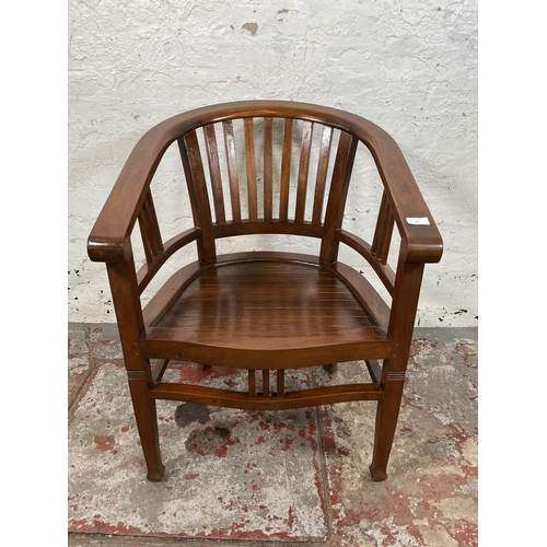 18 - An Indonesian teak Betawi chair - approx. 82cm high x 61cm wide x 50cm deep