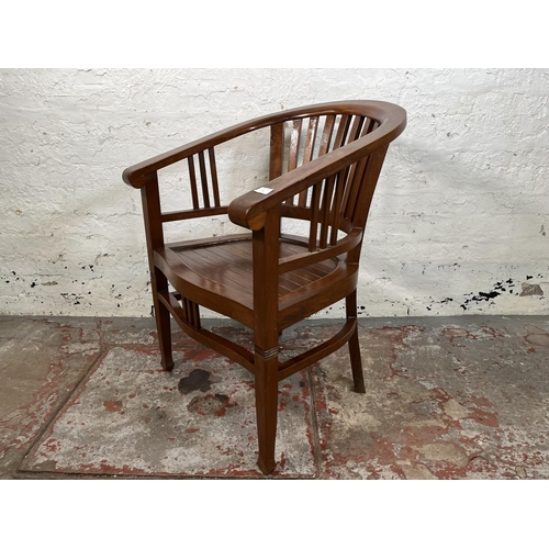 18 - An Indonesian teak Betawi chair - approx. 82cm high x 61cm wide x 50cm deep