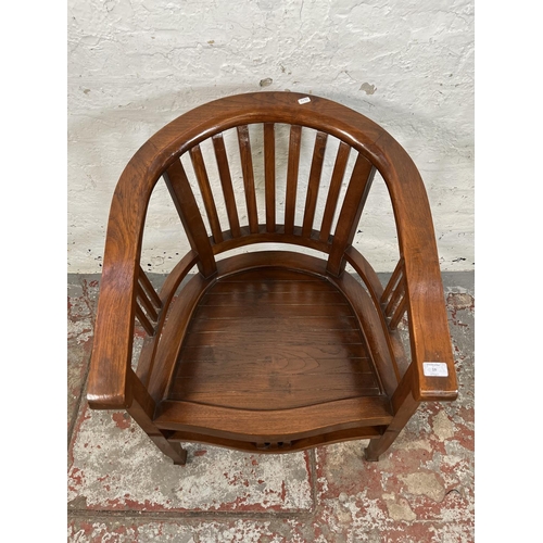 19 - An Indonesian teak Betawi chair - approx. 82cm high x 61cm wide x 50cm deep