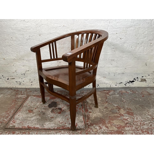 19 - An Indonesian teak Betawi chair - approx. 82cm high x 61cm wide x 50cm deep