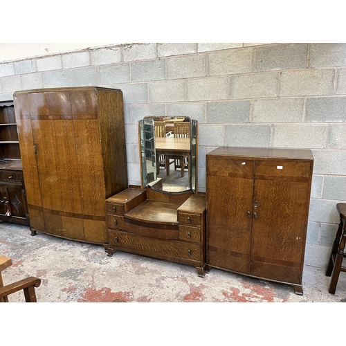 2 - A mid 20th century oak three piece bedroom suite