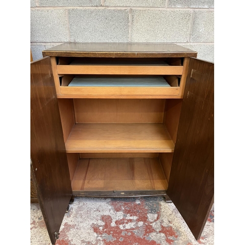 2 - A mid 20th century oak three piece bedroom suite