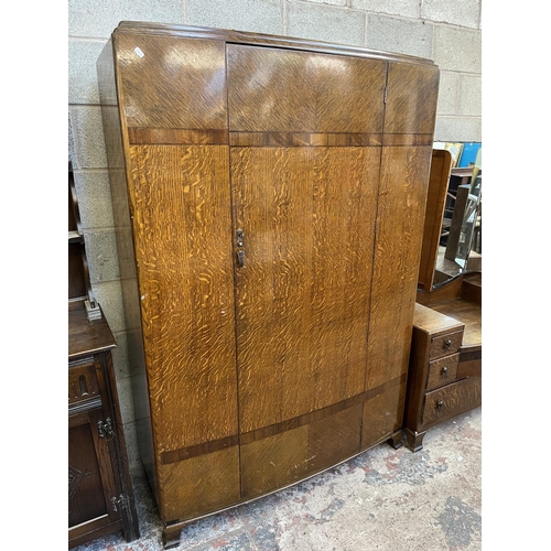 2 - A mid 20th century oak three piece bedroom suite