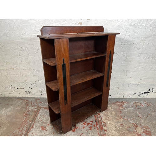 21 - An Art Deco Atcraft oak four tier bookcase - approx. 98cm high x 76cm wide x 21cm deep