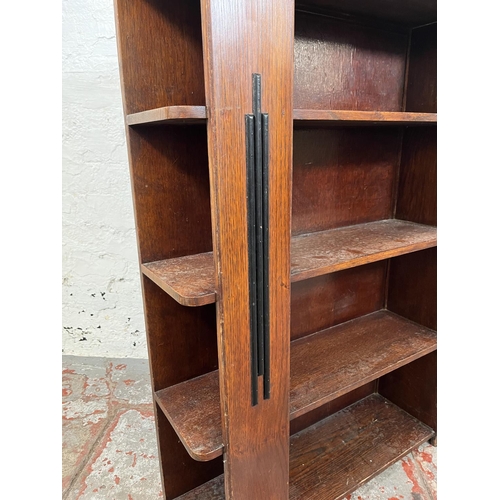 21 - An Art Deco Atcraft oak four tier bookcase - approx. 98cm high x 76cm wide x 21cm deep