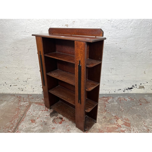 21 - An Art Deco Atcraft oak four tier bookcase - approx. 98cm high x 76cm wide x 21cm deep