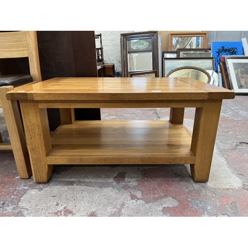 22 - A Besp-Oak solid oak rectangular two tier coffee table - approx. 46cm high x 61cm wide x 91cm long