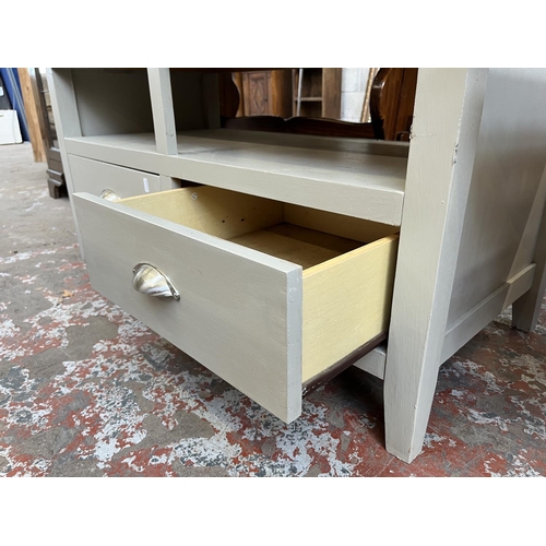 32 - A modern grey painted TV stand - approx. 54cm high x 106cm wide x 50cm deep