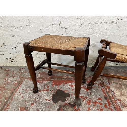 38 - Two 19th century style elm and rush seated stools - largest approx. 33cm high x 30cm wide x 66cm lon... 