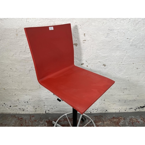 45 - A Vitra .04 red plastic and metal counter chair designed by Maarten Van Severen - approx. 122cm high... 