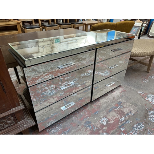 48 - A mirrored glass chest of drawers