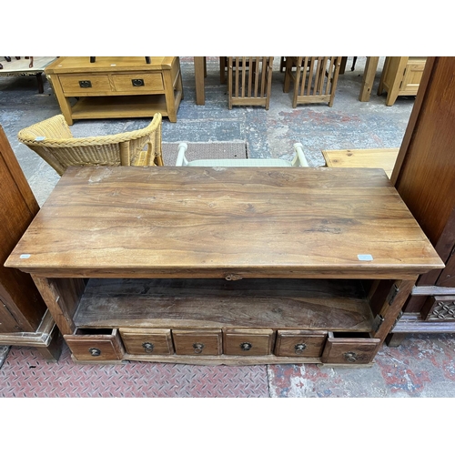 50 - An Indian sheesham wood TV stand