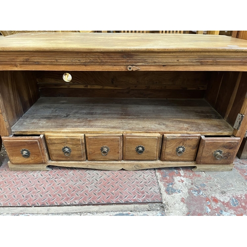 50 - An Indian sheesham wood TV stand