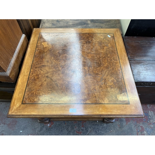 53 - A burr walnut square coffee table - approx. 52cm high x 75cm wide x 75cm deep