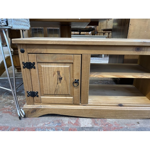 57 - A Mexican pine TV stand - approx. 51cm high x 130cm wide x 35cm deep