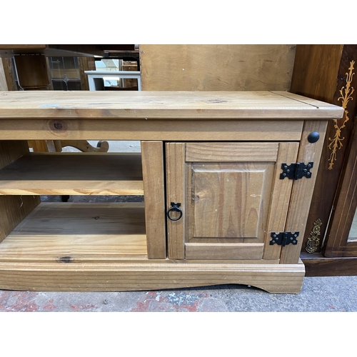 57 - A Mexican pine TV stand - approx. 51cm high x 130cm wide x 35cm deep