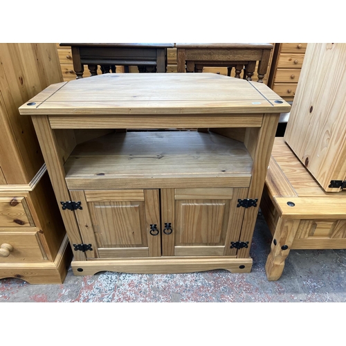 63 - Three pieces of Mexican pine furniture, bedside cabinet, coffee table and TV stand - approx. 78cm hi... 