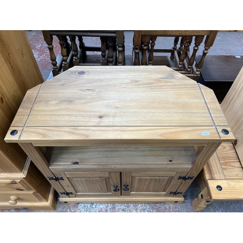 63 - Three pieces of Mexican pine furniture, bedside cabinet, coffee table and TV stand - approx. 78cm hi... 