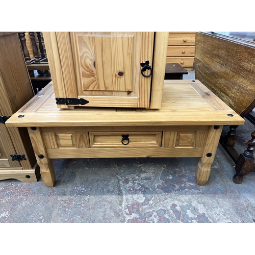 63 - Three pieces of Mexican pine furniture, bedside cabinet, coffee table and TV stand - approx. 78cm hi... 