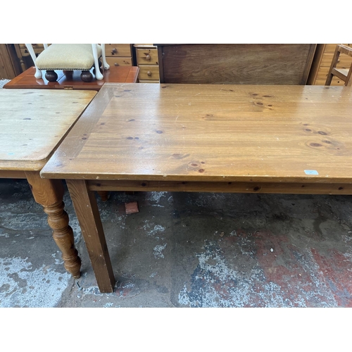 67 - A pine rectangular dining table - approx. 76cm high x 92cm wide x 183cm long