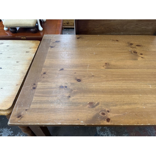 67 - A pine rectangular dining table - approx. 76cm high x 92cm wide x 183cm long