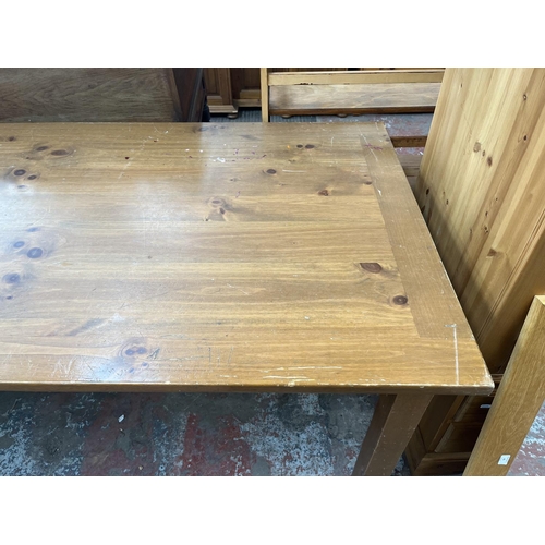 67 - A pine rectangular dining table - approx. 76cm high x 92cm wide x 183cm long