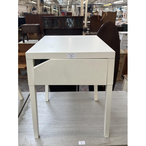 73 - A pair of IKEA white metal bedside tables - approx. 56cm high x 36cm wide x 37cm deep