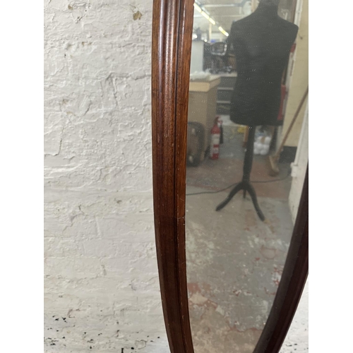 76 - A 19th century style mahogany framed tripod pedestal cheval mirror - approx. 162cm high x 42cm wide