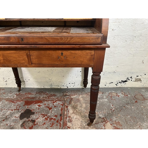 78A - A Victorian mahogany roll top writing desk with two drawers, galleried top and turned supports - app... 