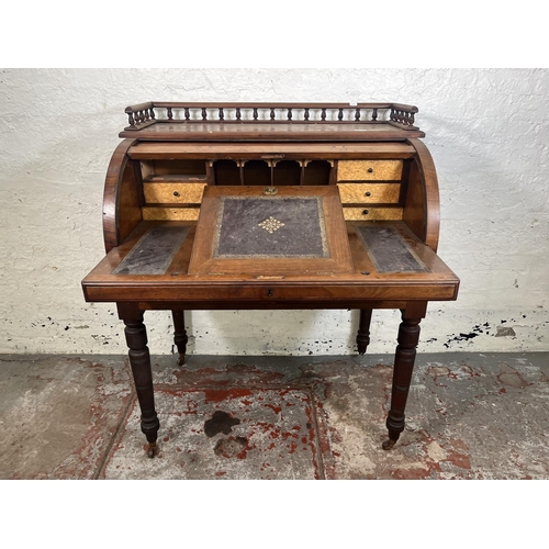 78A - A Victorian mahogany roll top writing desk with two drawers, galleried top and turned supports - app... 