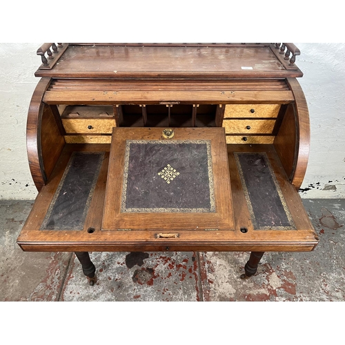 78A - A Victorian mahogany roll top writing desk with two drawers, galleried top and turned supports - app... 