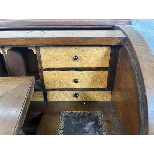 78A - A Victorian mahogany roll top writing desk with two drawers, galleried top and turned supports - app... 