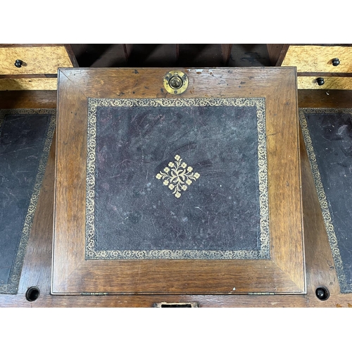 78A - A Victorian mahogany roll top writing desk with two drawers, galleried top and turned supports - app... 