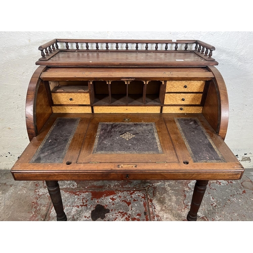 78A - A Victorian mahogany roll top writing desk with two drawers, galleried top and turned supports - app... 