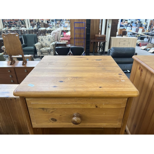 89 - A pair of pine bedside cabinets - approx. 61cm high x 44cm wide x 41cm deep