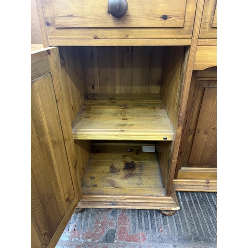 90 - A Victorian style pine sideboard - approx. 90cm high x 130cm wide x 46cm deep