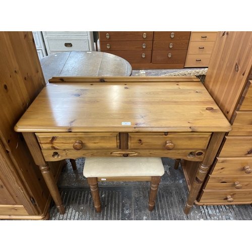 93 - A pine dressing table and stool - approx. 79cm high x 94cm wide x 46cm deep