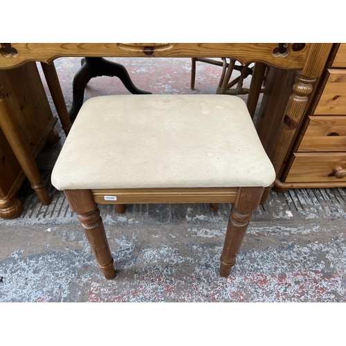 93 - A pine dressing table and stool - approx. 79cm high x 94cm wide x 46cm deep